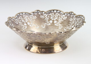 A pierced silver shallow bowl with scroll decoration Sheffield 1964, 270 grams, 18cm 