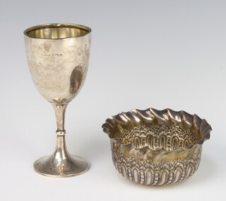 A Victorian repousse silver bowl Birmingham 1897 10cm together with a silver cup Birmingham 1913 130 grams