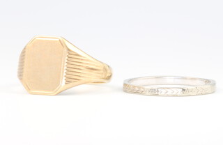 A 9ct yellow gold signet ring 4.6 grams size R and an 18ct white gold wedding band 2 grams size Q 1/2