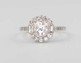A platinum Art Deco style diamond and cluster ring approx. 0.85ct, size N