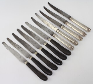 A set of 6 19th Century French steel bladed dinner knives, the blades marked Quaute Superieure VH with horn handles together 5 Continental 19th Century steel bladed knives with silver plated handles the blades marked Meuron 