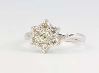 An 18ct white gold 7 stone diamond cluster daisy ring approx. 1ct, size Q, 4.8 grams 