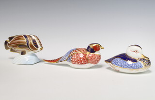 A Royal Crown Derby Imari pattern paperweight in the form of a duckling with silver stopper 11cm, ditto tropical fish "Sweet Lips" silver stopper 13cm and a pheasant silver stopper 17cm 