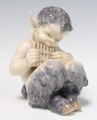 A Royal Copenhagen figure of Pan playing his pipes 15cm 