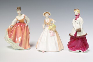 A Royal Doulton figure - Fair Lady (coral pink) HN2835 19cm, 2 Royal Worcester figures - Winter Waltz 19cm and Rachael 18cm 