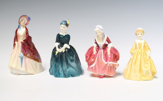 Three Royal Doulton figures - Cherrie HN2341 14cm, Paisley Shawl HN1988 15cm and Goody Two Shoes HN2037 14cm and a Worcester ditto Little Grandmother 12cm 
