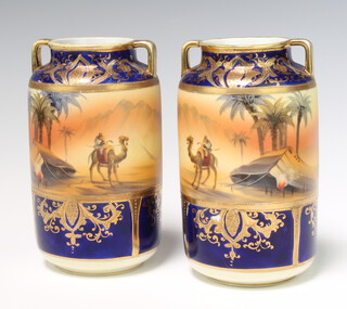A pair of Art Deco Noritake 2 handled cylindrical vases decorated with Egyptian scenes, figures and camels, 16cm 
