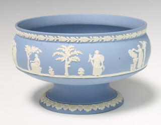 A Wedgwood blue Jasperware pedestal bowl decorated with figures before trees 22cm 