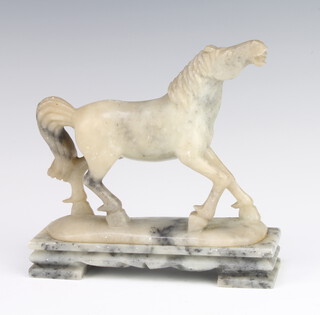 A carved 2 colour soapstone figure of a standing horse 15cm 