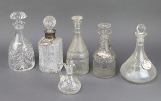 A square cut glass spirit decanter and stopper, a club shaped decanter and stopper, 3 other decanters (all a/f) and a small cut glass ewer 