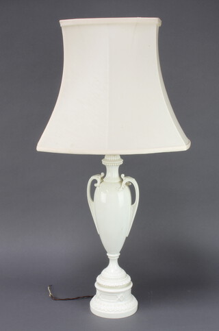 A Royal Worcester white glazed table lamp in the form of a twin handled urn, raised on a circular base, with black Royal Worcester mark 1957 40cm x 13cm 