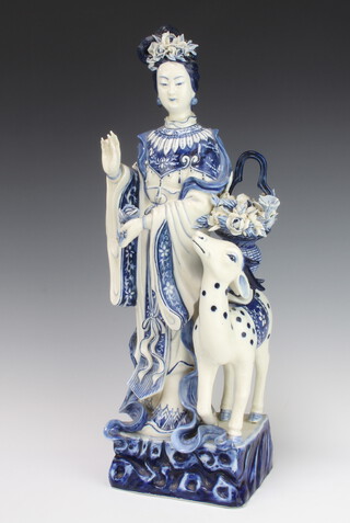 A 20th Century Chinese figure of a standing lady with fawn and basket of flowers 49cm x 16cm x 12cm 
