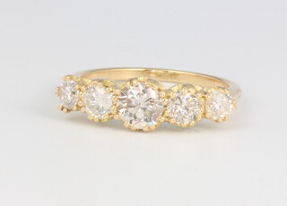 An 18ct yellow gold 5 stone graduated diamond ring approx. 1.59ct, 2.9 grams, size L 1/2