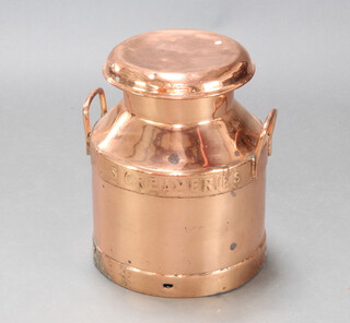 A copper twin handled milk churn marked Daws Creameries Totnes  45cm h x 34cm diam.  