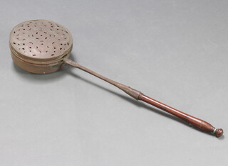 A 17th/18th Century circular pierced copper warming pan with iron and turned wooden handle 10cm x 28cm, handle 74cm l 