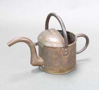 A 19th Century circular copper 2 gallon watering can marked 2 Gall 37cm h x 58cm x 30cm 