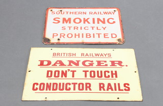 A Southern Railways enamel sign "No smoking strictly prohibited" 30cm x 41cm (enamel damaged to the corners) together with a British Railway "Danger do not touch conductor rails" 32cm x 51cm (some rust to enamelling)  