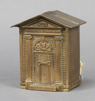 A Den Danske Landmandsbank Oddfellows brass money box in the form of a building no. 4722, complete with key 12cm h x 8cm w x 6.5cm d  