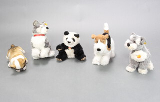 A Steiff figure of a Husky 38cm x 35cm, ditto Bulldog 24cm x 11cm, ditto Airedale Terrier 35cm x 35cm, 1 other dog 34cm x 30cm and a ditto Panda 31cm x 27cm  