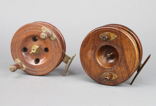 Two Edwardian brass and mahogany 5" centre pin fishing reels  