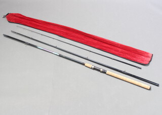 A Shimano Stradic multi range feeder fishing rod in original cloth bag  