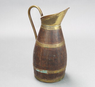 A 19th Century brass coopered jug 60cm x 25cm 