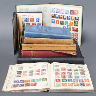 An album of GB mint stamps Edward VIII to Elizabeth II, a red Standard album of used world stamps and 6 albums of world stamps - New Zealand, Poland, Malta, Italy, Hungary, Holland, Germany, France, Canada 