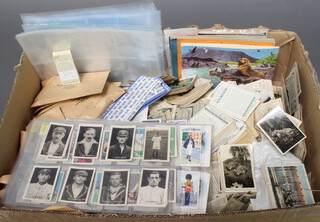 A large collection of loose cigarette cards including Wills, Cavenders, Ogdens etc 