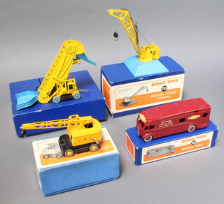 Dinky, a 581 maroon Horse Box in blue box, a 571 Coles Mobile Crane in blue box, a 752 Goods Yard Train in blue box and a 564 elevator loader in blue box