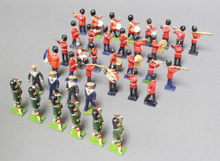 A collection of Britains, Fylde and other lead figures: Guardsmen & Highlanders