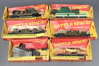 A quantity of Triang Dublo Battle Space rolling stock comprising R.128K battle rescue helicopter cover, P341K searchlight, R34K missile launcher etc 