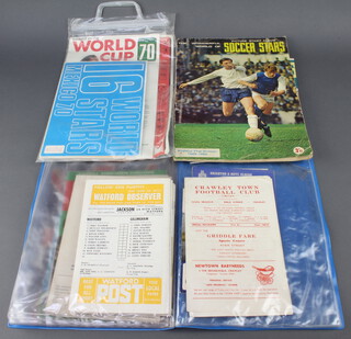 A collection of football programmes and ephemera including A 1986 World cup souvenir portfolio, a 1968-69 picture stamp album "The Wonderful World of Soccer Stars", programme for the home International Match England V Scotland Saturday May 10th 1969 and a Daily Express Community Singing pamphlet, England V Ireland Wednesday November 22nd 1967 European Championship, England V Spain April 3rd 1969 European Championship, England V Sweden Wed 22nd May 1969 International Match, England V USSR Wed Dec 6 1967 International Match, England V N.Ireland Tuesday April 21st 1970 Home International Championship, England V France Wed March 12 1969 International Match, England V Portugal Wed 10th December 1969 International Match, Chelsea V Leeds United Saturday 11th April 1970 FA Cup Final, two Benfica FC v Manchester United Wed May 29th 1969 European Champion Clubs Cup at Wembley, Manchester City V West Bromwich Albion Saturday March 7 1970 The Football League Cup Final, Manchester United V Newcastle United Saturday September 21st 1968 league game, Arsenal V Manchester United Tuesday 30 August 1977 Football League Cup Second Round, Crystal Palace V Stoke City Saturday 6th September 1969 and Crystal Palace V Notts. Forest Saturday 17th January 1970 Division One, two Watford V Chelsea Saturday 14th March 1970 FA Cup semi-final, two Watford V Cardiff City Sat 21st March 1970 division two, Watford V Gillingham Sat 7th February 1970 FA Cup 5th Round, Crawley Town V Hereford United and Crawley Town V Brighton & Hove Albion 1969-70 season, two Chelsea V Stoke City Sat 8th February 1969 FA Cup 5th round, Chelsea V Manchester United Sat 15th March Division One, Tottenham Hotspur V Ipswich Town Tuesday 18th March 1969 Division one, Brighton & Hove Albion V Walsall Saturday 4th February 1967 Division III, a World Cup Mexico 70 Datakit  and a Soccer '68 All The Club Colours poster (presented free with JAG)