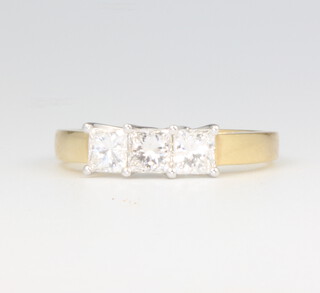An 18ct yellow gold princess cut 3 stone diamond ring approx. 1ct, 3.8 grams, size N