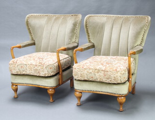 A pair of 1940's walnut open framed, cloud back, armchairs upholstered in green material, raised on cabriole supports 87cm h x 74cm w x 58cm d (seat 46cm  x 50cm) 