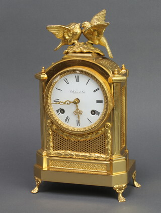 Collection D'Art, an 8 day striking mantel clock with enamelled dial and Roman numerals contained in a arched gilt metal case surmounted by figures of doves 29cm h x 16cm w x 9cm d, complete with key 