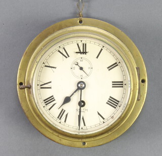 A Smiths Astral ward room style clock with 14cm painted dial, Roman numerals and subsidiary second hand, contained in a brass case 10cm x 20cm 