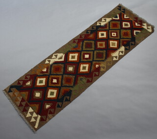 A tan, black and white ground Maimana Kilim runner with diamond design to the centre 190cm x 60cm 