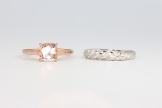 A 9ct yellow gold gem set ring 2 grams, size O and a 9ct white gold wedding band 2.3 grams, size O