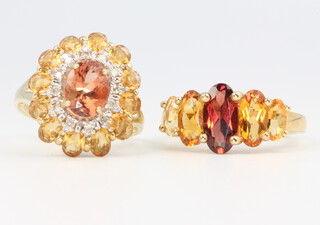 Two 9ct yellow gold gem set dress rings size O, 7 grams