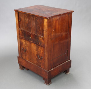 A 19th Century Continental mahogany commode with cupboard enclosed by a tambour shutting above 1 long drawer and commode drawer 76cm h x 54cm w x 39cm d 