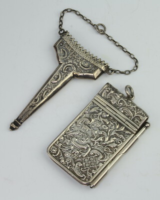 An Edwardian silver repousse aide memoire London 1902 together with an Edwardian silver scissor holder Birmingham 1876