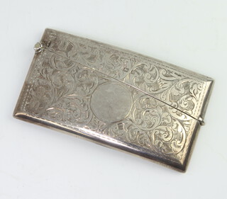 A George V silver card case with engraved scroll decoration Birmingham 1912 46 grams