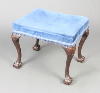 A Georgian style rectangular mahogany stool, seat upholstered in blue material raised on cabriole, ball and claw supports 51cm h x 58cm w x 44cm d 