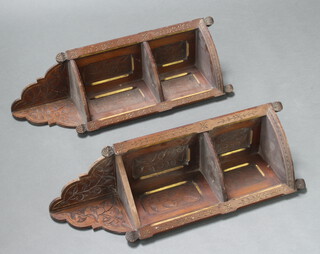 A pair of Victorian carved oak corner shelves fitted 2 niches 68cm h x 18cm x 18cm (1 with top shelf damaged)