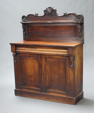 A Victorian rosewood chiffonier, the raised back fitted a shelf above a drawer and cupboard enclosed by panelled doors 135cm h x 104cm w x 39cm d 