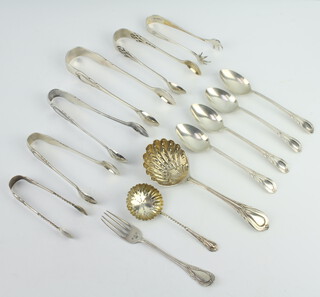 An Edwardian silver lily pattern sifter spoon and a quantity of lily pattern forks and tongs etc, weighable silver 312 grams