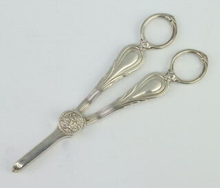 A pair of modern silver lily pattern grape scissors 108 grams
