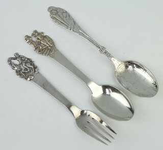 Two Continental silver teaspoons with fancy handles and a fork 68 grams
