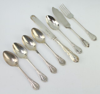 An Edwardian silver lily pattern teaspoon Birmingham 1908, 4 others, a butter knife, knife and fork 