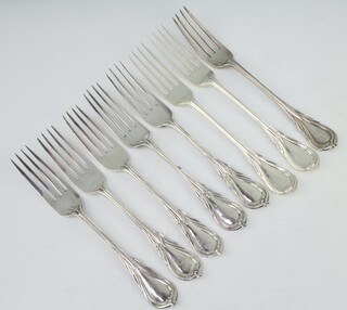 A Victorian silver lily pattern table fork London 1868, 7 others, mixed dates, 728 grams 